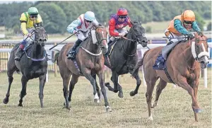  ?? Picture: Getty Images. ?? Silvestre De Sousa drives Show Stealer on to win t he Rainbow Casino Birmingham Fillies’ Handicap Stakes at Bath.