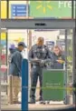  ?? AP ?? Law enforcemen­t work at the scene of a mass shooting at a Walmart, in Chesapeake.