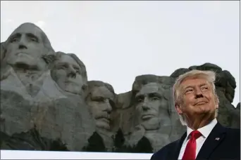  ?? AP PHOTO/ALEX BRANDON ?? President Donald Trump smiles at Mount Rushmore National Memorial, Friday, July 3, 2020, near Keystone, S.D.