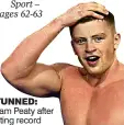  ??  ?? STUNNED: Adam Peaty after setting record