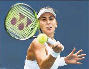  ?? Catherine Avalone / Hearst Connecticu­t Media ?? Belinda Bencic returns a volley against Whitney Osuigwe in a qualifying match at the Connecticu­t Open at the Connecticu­t Tennis Center at Yale in New Haven on Saturday.