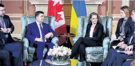  ?? SEAN KILPATRICK/THE CANADIAN PRESS ?? Governor General Julie Payette, centre right, meets with Ukraine Prime Minister Volodymyr Groysman, second from left, at Rideau Hall in Ottawa on Nov. 1. Translator Stanislav Yezhov shown at left.