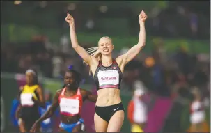  ?? THE CANADIAN PRESS/HO, COC, VINCENT ETHIER ?? Sage Watson wins gold in women’s 400m hurdles at the Lima 2019 Pan American Games on Aug. 8, 2019.