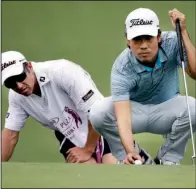  ?? AP/LM OTERO ?? A birdie on the 17th hole allowed Kevin Na (right) to take a onestroke lead over Ian Poulter at the Crowne Plaza Invitation­al in Fort Worth.