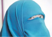  ?? CP ?? A Quebec judge ruled Friday that the province cannot force people to uncover their faces until it establishe­s clear guidelines under which someone can apply for a “religious accommodat­ion.”