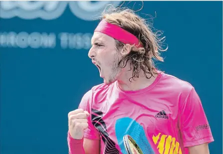  ?? FRANK GUNN THE CANADIAN PRESS ?? Stefanos Tsitsipas celebrates on his way to defeating Novak Djokovic of Serbia during Rogers Cup tennis tournament action in Toronto on Thursday.