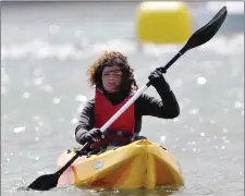  ??  ?? A kayaker during the Mullaghmor­e Tri.