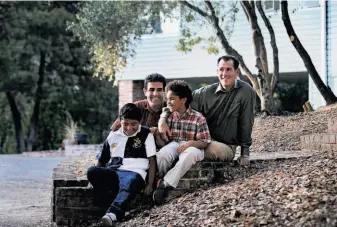  ??  ?? Picciotto and Perry relax at their new home with their children, 12-year-old Ben (left) and Louisa, 7. Their new home has twice the square footage of the house in Bernal Heights.