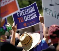  ?? (AP/Matt York) ?? Abortion rights supporters gather outside the Capitol in Phoenix on Wednesday.