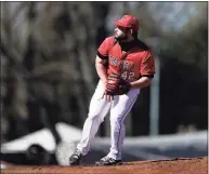  ?? Adam Hunger / Associated Press ?? Fairfield pitcher John Signore delivers against Canisius on March 21.