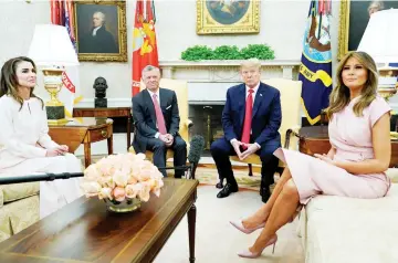  ??  ?? King Abdullah meets with Trump accompanie­d by Queen Rania and first lady Melania Trump in the Oval Office of the White House in Washington. — Reuters photo