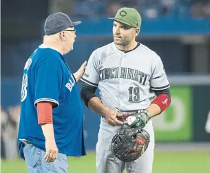  ?? RICK MADONIK TORONTO STAR FILE PHOTO ?? In May 2017, Steve Breitner threw out the first pitch at a Reds-Blue Jays game in front of former pupil Joey Votto, a six-time MLB all-star who leads all active players in on-base percentage.