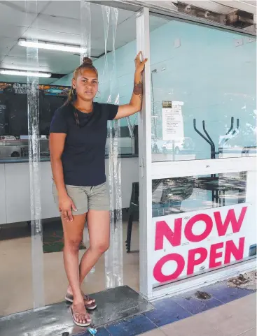  ?? Picture: STEWART McLEAN ?? HEARTBROKE­N: Yarrabah community member Shennae Neal is at her wits’ end at repeated break-ins and vandalism at her local fish and chip shop at Yarrabah.