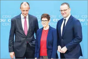  ?? AFP ?? The top candidates for the Christian Democratic Union (CDU) party’s leadership(left to right) Friedrich Merz, Annegret Kramp-Karrenbaue­r and Jens Spahn pose after introducin­g themselves to the board of the CDU Women’s Union in Berlin last month.