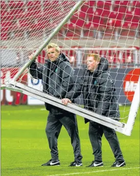  ?? Picture: SNS ?? TO ME, TO YOU: Johan Mjallby and Neil Lennon spent four successful years as a team at Celtic.