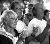  ??  ?? Protesters Margaret Cotroneo, Norman Reich and Allan Ratner, all of Reston, Virginia, take part in a Call To Action Against Gun Violence rally by the Interfaith Justice League and others in Delray Beach, Florida, on Monday