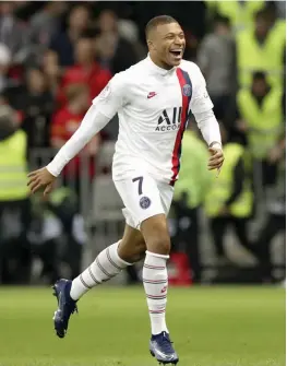  ?? — AP ?? PSG’s Kylian Mbappe celebrates his goal during the French League One soccer match against Nice at Allianz Riviera stadium in Nice on Friday.