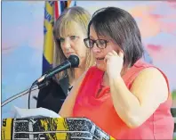  ?? GREG MCNEIL/CAPE BRETON POST ?? Lisa Benoit fights back tears as she talks about her late father, Bennie Benoit, during the Day of Mourning commemorat­ion at branch 128 Royal Canadian Legion in Whitney Pier on Friday. Her father was among the 26 men killed in the Westray Mine disaster in 1992.