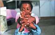  ?? Picture: Phando Jikelo/African News Agency/ANA ?? BRITTLE BONES: Kuhle Ngcukana, 6, from Masiphumel­ele, has osteoporos­is.