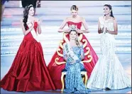  ?? (AFP) ?? Mireia Lalaguna Rozo, Miss World Spain, is crowned after winning the new title at the Miss World Grand Final in Sanya, in southern China’s Hainan province, on Dec 19. Contestant­s from over 110 countries competed in the final of the 65th Miss...