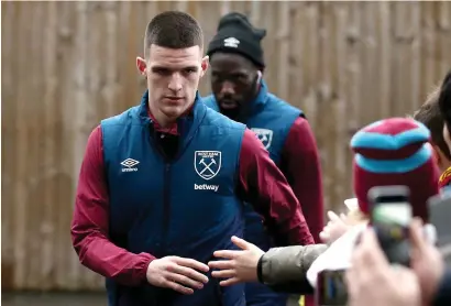  ??  ?? Declan Rice has signed a new contract to resolve his club situation but his internatio­nal future remains unclear