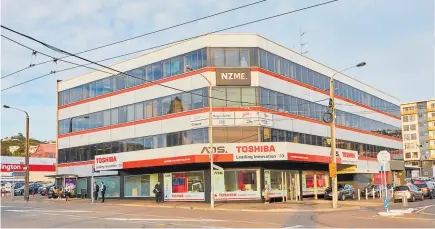  ?? ?? A four-level office building on the corner of Taranaki and Abel Smith streets, in Wellington, is for sale. Photo / Supplied