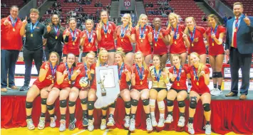  ?? GARD/POST-TRIBUNE PHOTOS
MICHAEL ?? The Andrean girls volleyball team poses with the Class 2A state championsh­ip trophy.