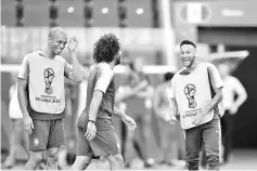  ??  ?? (From L) Brazil’s defender Miranda, defender Marcelo and forward Neymar take part to a training session on the eve of the Russia 2018 World Cup round of 16 football match between Brazil and Mexico on July 1, 2018 in Samara. - AFP photo