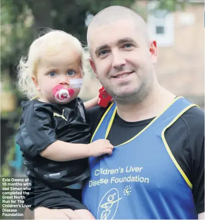  ??  ?? Evie Owens at 18 months with dad Simon who completed the Great North Run for The Children’s Liver Disease Foundation