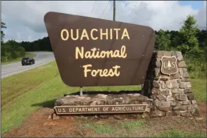  ?? The Sentinel-Record/Richard Rasmussen ?? DAY-USE AREAS: A motorist heads west into the Ouachita National Forest on Highway 270 west of Hot Springs on Thursday. Some day-use areas on the forest have reopened.