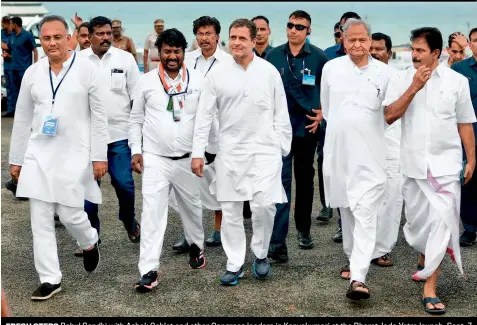  ?? ?? FRESH STEPS Rahul Gandhi with Ashok Gehlot and other Congress leaders in Kanyakumar­i at the Bharat Jodo Yatra launch, Sept. 7