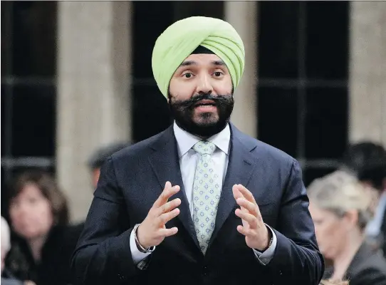  ?? ADRIAN WYLD/THE CANADIAN PRESS ?? A bill introduced by Innovation Minister Navdeep Bains would require distributi­ng Canadian companies to publish the gender compositio­n of boards.