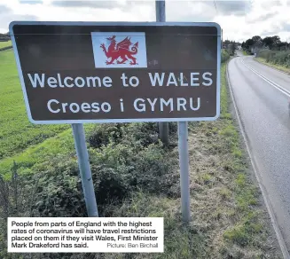  ?? Picture: Ben Birchall ?? People from parts of England with the highest rates of coronaviru­s will have travel restrictio­ns placed on them if they visit Wales, First Minister Mark Drakeford has said.