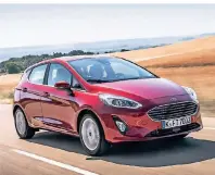  ?? FOTO: FORD ?? Ford hat seinem quirligen Fiesta, den es als Drei- und Fünftürer gibt, einen Mildhybrid-antrieb verpasst.