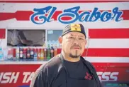  ?? EDDIE MOORE/JOURNAL ?? Ever Paz, the executive chef and owner of El Sabor Spanish Tapas y Masss, poses outside his food truck.