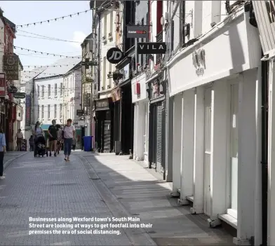  ??  ?? Businesses along Wexford town’s South Main Street are looking at ways to get footfall into their premises the era of social distancing.