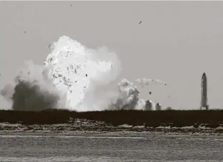  ?? Photos by Kin Man Hui / Staff photograph­er ?? SpaceX Starship SN9 erupts into a fireball as it attempted to land after a test flight from the launch site near Boca Chica Village.