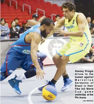  ?? JOEY MENDOZA ?? Stanley Pringle drives to the basket against Marcellus Sarmento of Brazil in their Fiba 3x3 World Cup game yesterday at the Phl Arena.