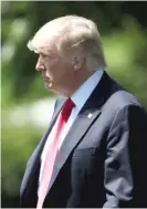  ??  ?? President Donald Trump walks toward Marine One before departing the White House on Friday.
| MARK WILSON/ GETTY IMAGES