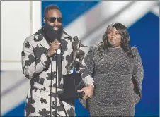  ?? AP PHOTO ?? James Harden of the Houston Rockets accepts the Most Valuable Player award as his mother, Monja Willis, looks on at the NBA Awards at the Barker Hangar in Santa Monica, Calif.