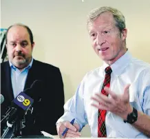  ?? NICK UT/ THE ASSOCIATED PRESS ?? Billionair­e climate activist Tom Steyer, right, speaks during a news conference with advocate Jamie Court, left, president of Consumer Watchdog in Santa Monica, Calif. this month.