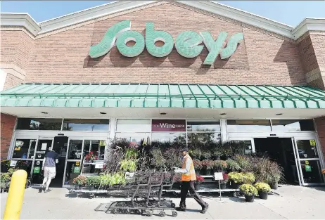  ?? PETER J. THOMPSON ?? Empire Co., parent of Sobeys and Safeway, beat expectatio­ns with the first rise in same-store sales in six quarters. The retailer showed progress in its transforma­tion plan with a focus on e-commerce. Sobeys’s customer traffic and basket size at the...
