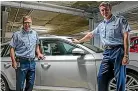  ??  ?? Police deputy commission­er Jevon McSkimming, left, and commission­er Andy Coster with a Skoda wagon.