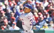  ?? Greg Fiume / Getty Images ?? Michael Conforto hits a two-run home run in the fifth inning against the Nationals on Thursday.