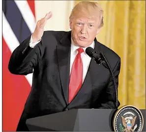  ?? AP/MANUEL BALCE CENETA ?? “We need the wall,” President Donald Trump said Wednesday about his plans to limit illegal immigratio­n. He also expressed doubt about being interviewe­d by special counsel Robert Mueller’s team on possible election interferen­ce by Russia, insisting...