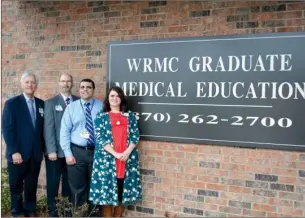  ?? HANNAH KELLER FLANERY/CONTRIBUTI­NG PHOTOGRAPH­ER ?? White River Health System’s internal-medicine residency program will accept its first class of residents in July. From left are Gary Bebow, CEO of WRHS; Jody Smotherman, associate administra­tor of graduate medical education; Dr. Khaled Khasawneh,...