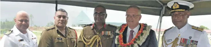  ?? Photo: WAISEA NASOKIA ?? RFMF Captain (Navy) John Fox, Operations Lieutenant-Colonel Pacolo Luveni, Deputy Commander RFMF – Brigadier General Mohammed Aziz, Australian Prime Minister Scott Morrison with RFMF Commander Rear Admiral Viliame Naupoto during the visit to the RFMF Training Camp at the Blackrock, in Nadi yesterday.