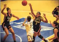  ?? UConn Athletics / Contribute­d Photo ?? UConn’s Olivia Nelson-Ododa (20) and Aailiyah Edwards (3) defend against Seton Hall on Dec. 15 in South Orange, N.J.