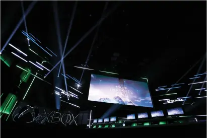 ??  ?? ABOVE:
“Halo Infinite” is seen on-screen June 10, 2018, at Xbox Experience at Microsoft Theater in Los Angeles. Microsoft Corp. is gearing up to launch a new Xbox console and a new installmen­t of its flagship multi-billion dollar Halo series in time for the holidays.