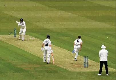  ??  ?? Middlesex skipper Peter Handscomb is bowled by David Payne at Lord’s